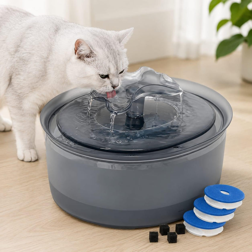Automatic pet water fountain with flowing filtered water for cats, featuring replacement filters and a quiet circulating pump.